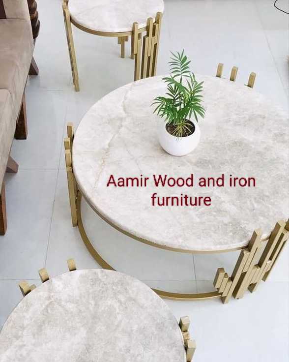 Round coffee Table by Naveed Rock