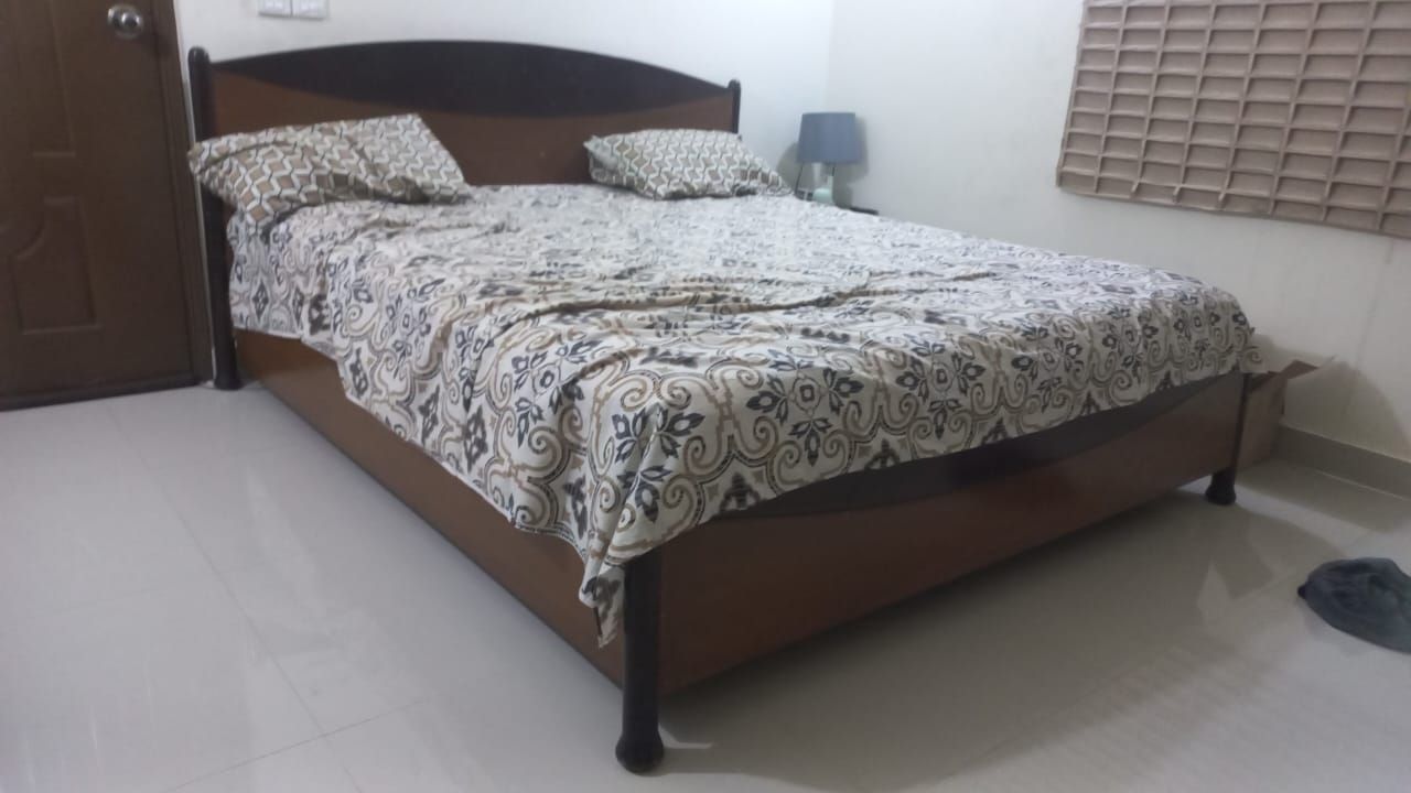 Bed qith aide tables by Sadia Adeel