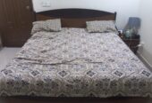 Bed qith aide tables by Sadia Adeel