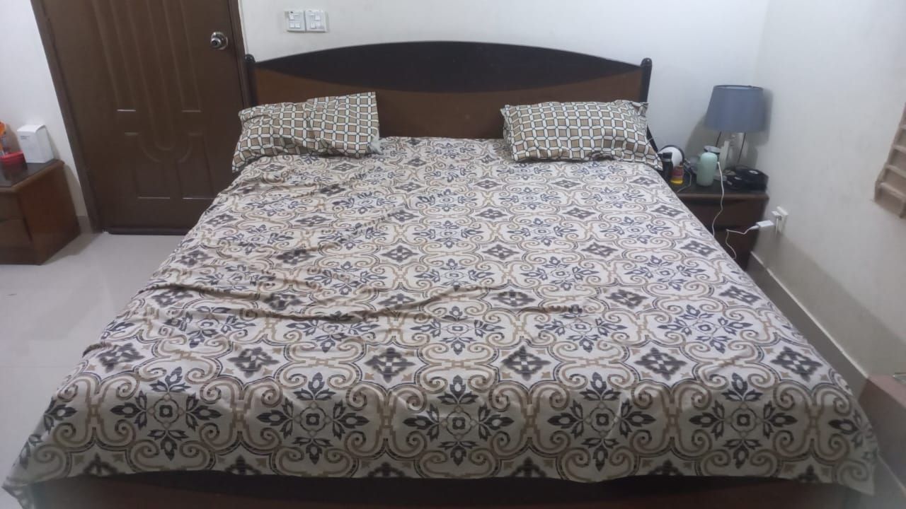 Bed qith aide tables by Sadia Adeel