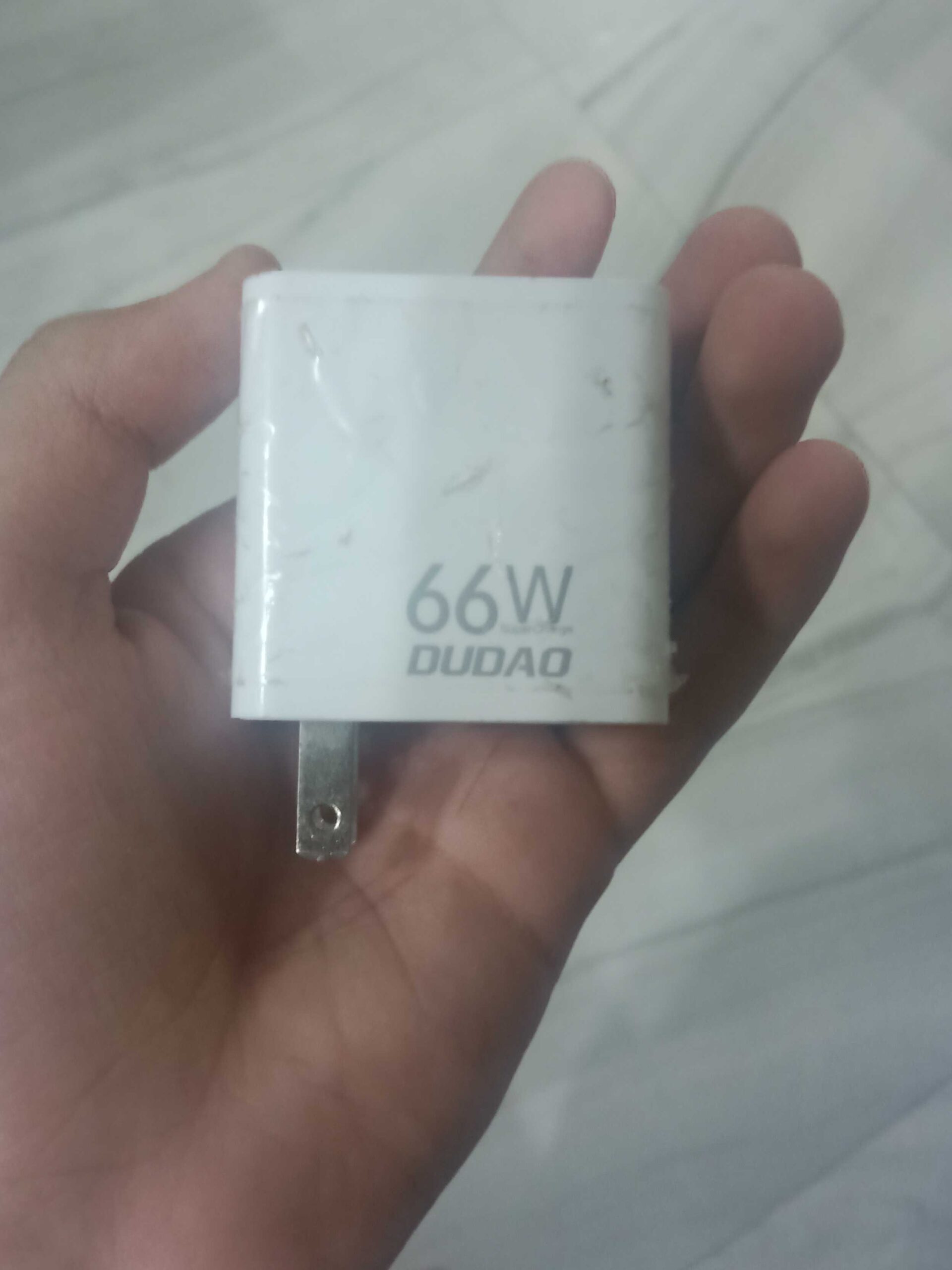 One plus 66 watts charger by Munir Mansoor