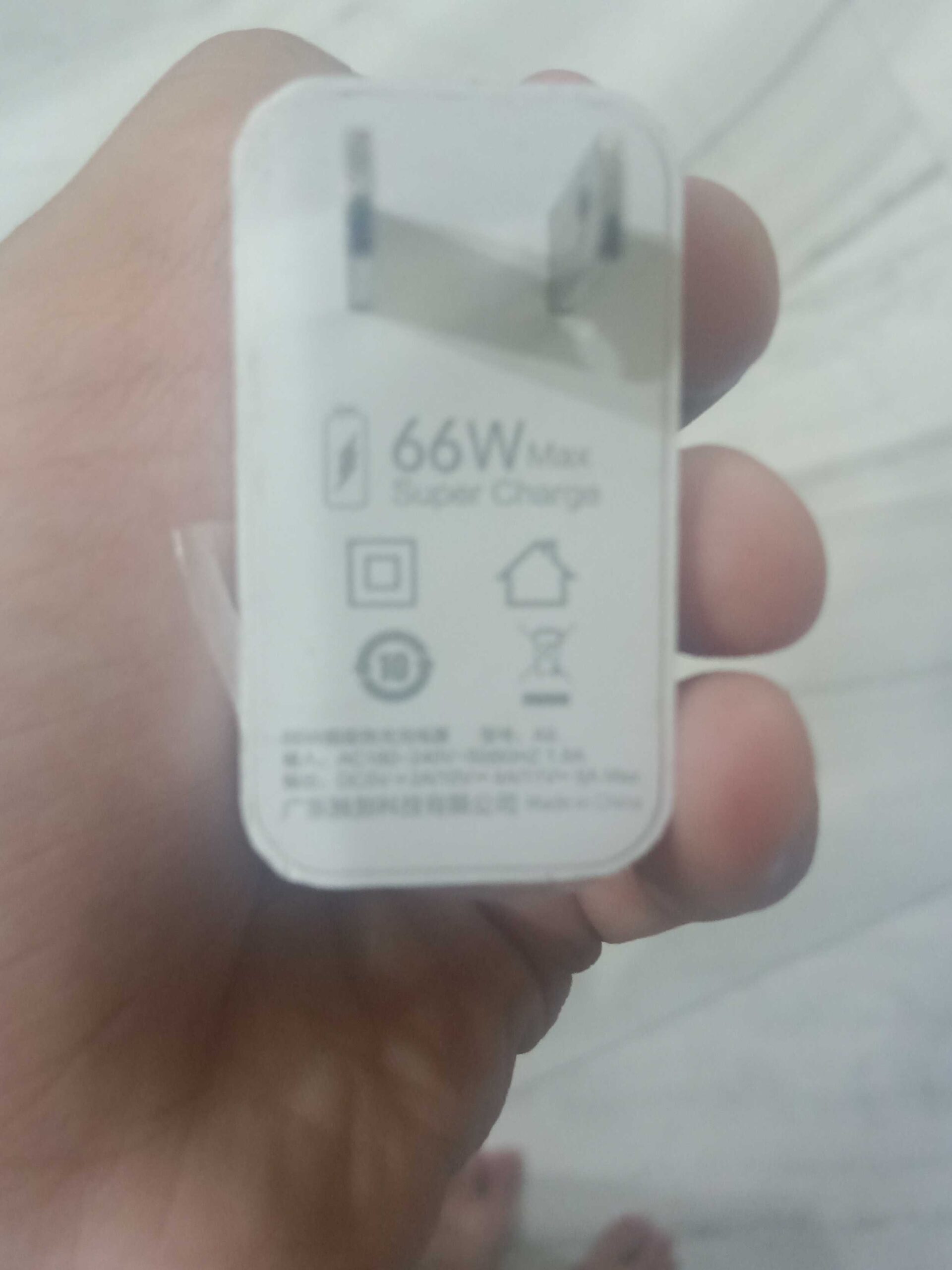 One plus 66 watts charger by Munir Mansoor