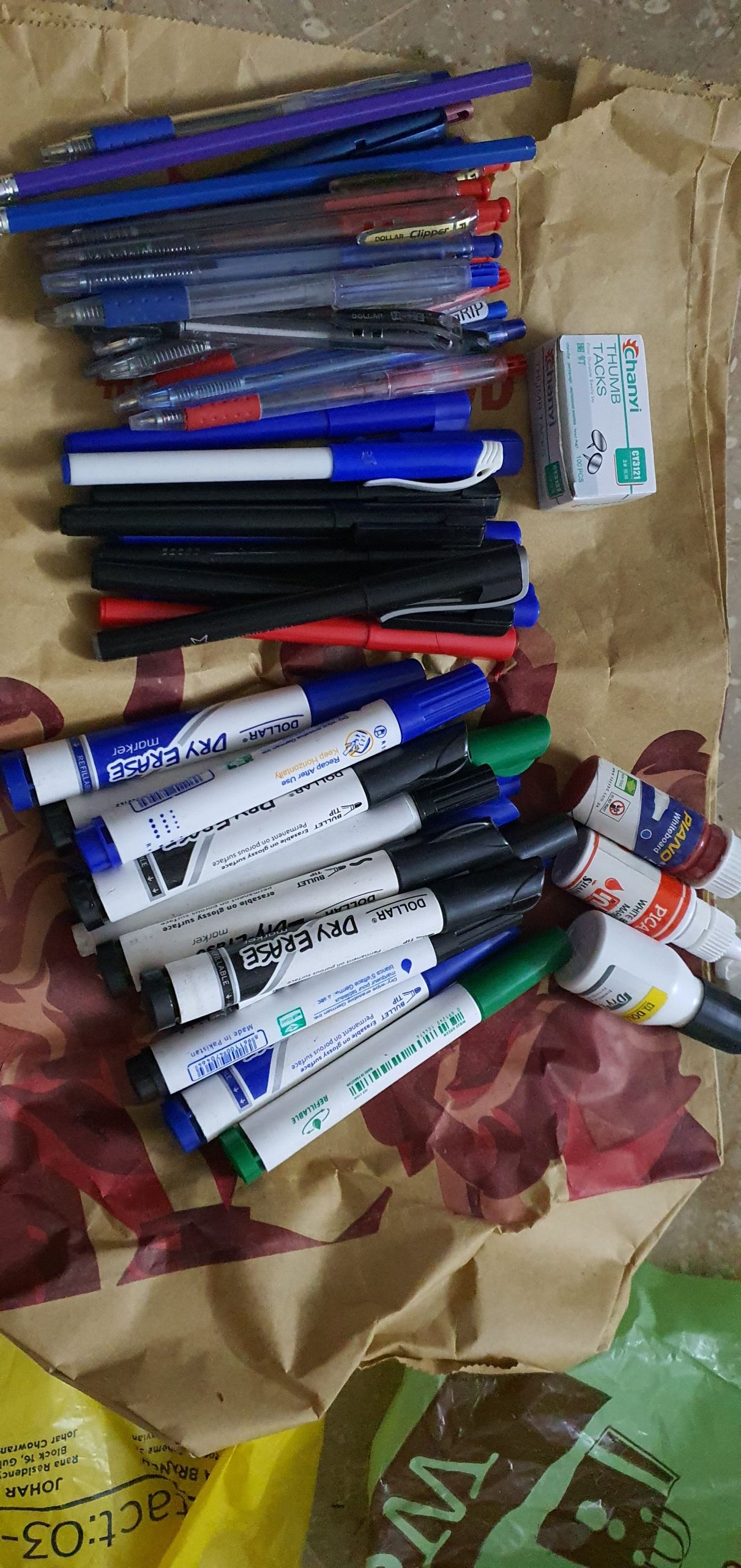 Markers pens inks and thumb pins by Sara Chaudhary