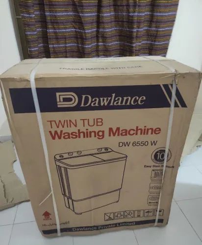 Dawlance twin Tub washing machine DW 6550 W box pack new piece by Abdul Rehman