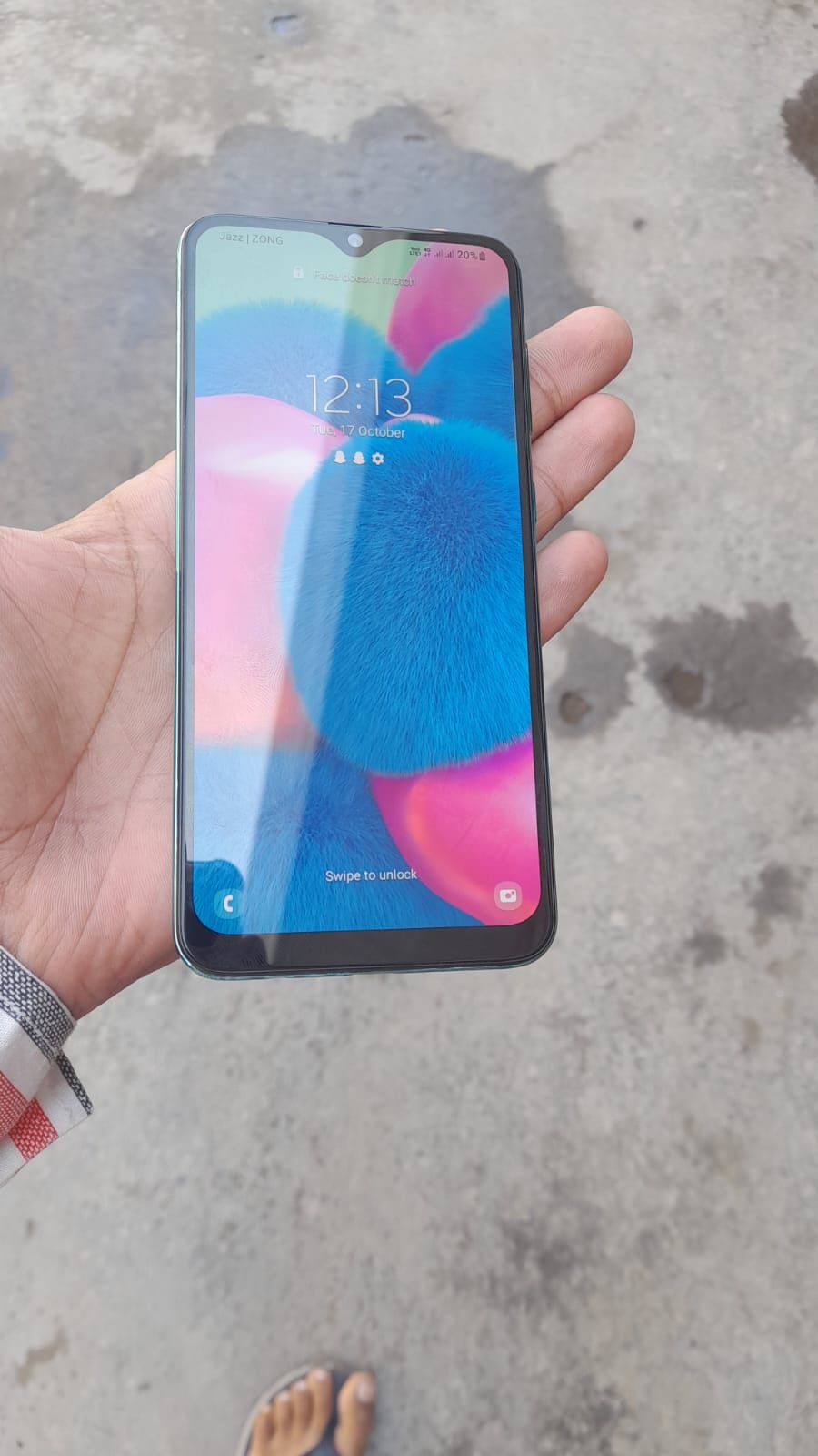 Samsungs a30 4gb 64g box and dopter ha pta finger nie chalta ha by Razab Ali