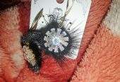 Beautiful Black and golden boo earing by Muhammad Ahmed Ali