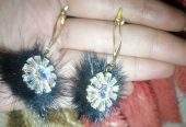 Beautiful Black and golden boo earing by Muhammad Ahmed Ali