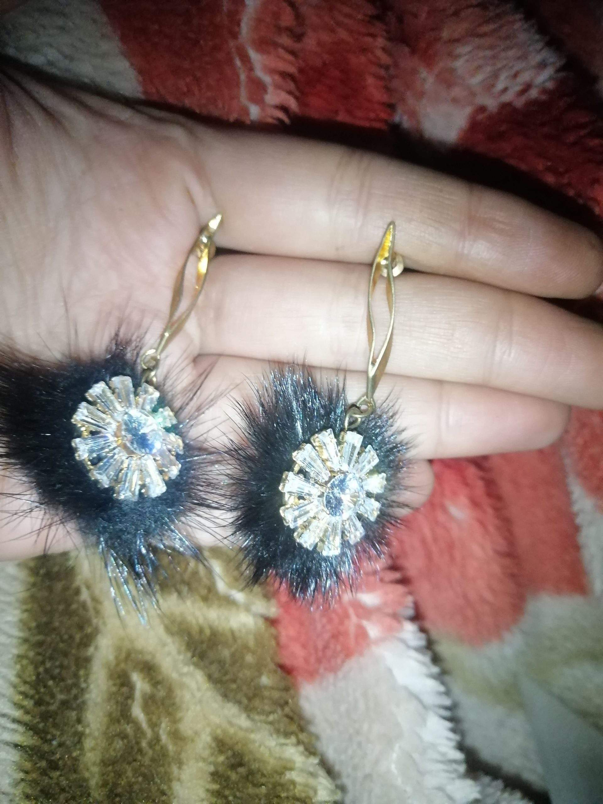 Beautiful Black and golden boo earing by Muhammad Ahmed Ali