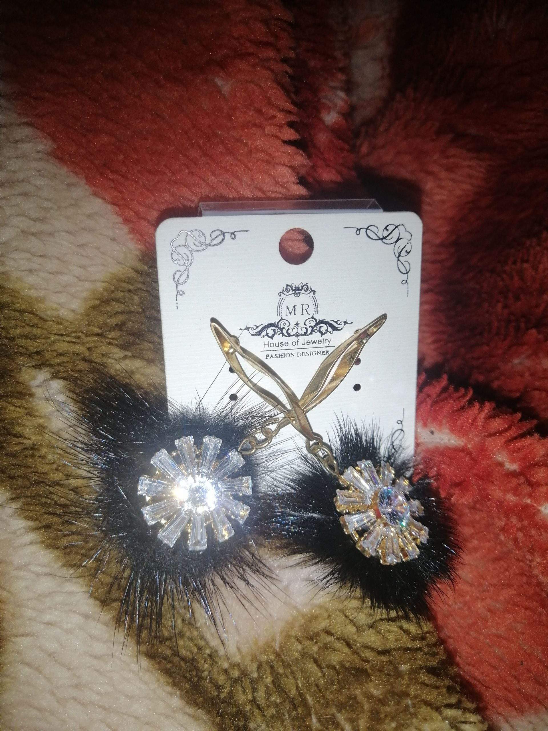 Beautiful Black and golden boo earing by Muhammad Ahmed Ali