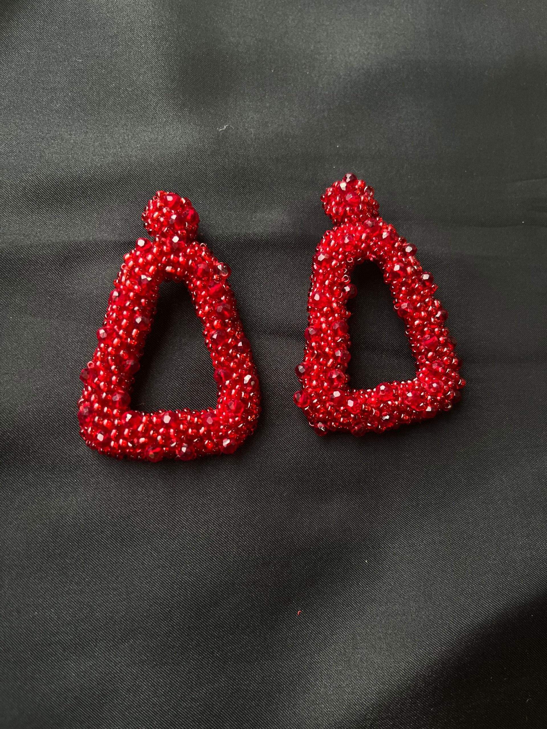 White and Red beaded earrings by Zarwish Javid