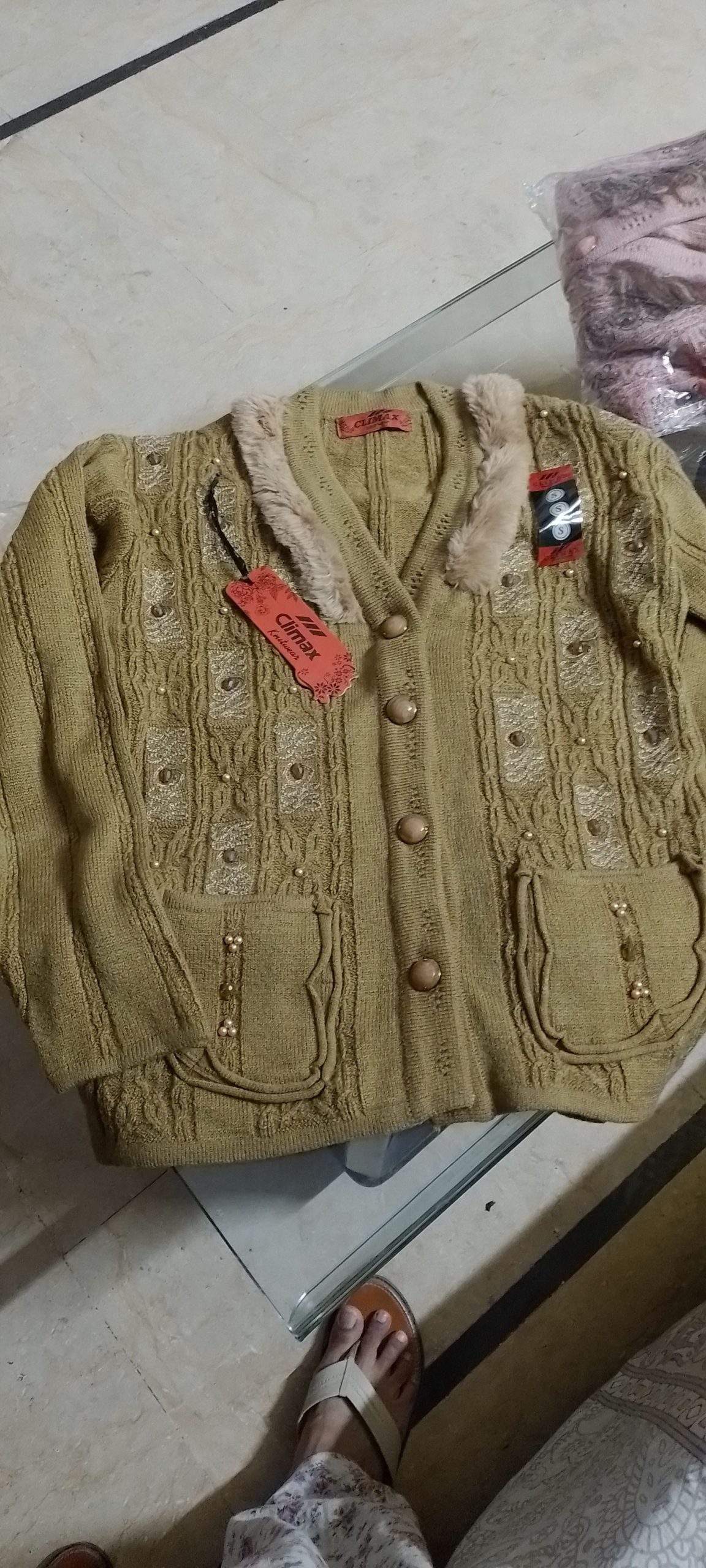 Sweaters by Afsha Khan