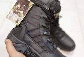 Army shoes by Qayyoom Jutt