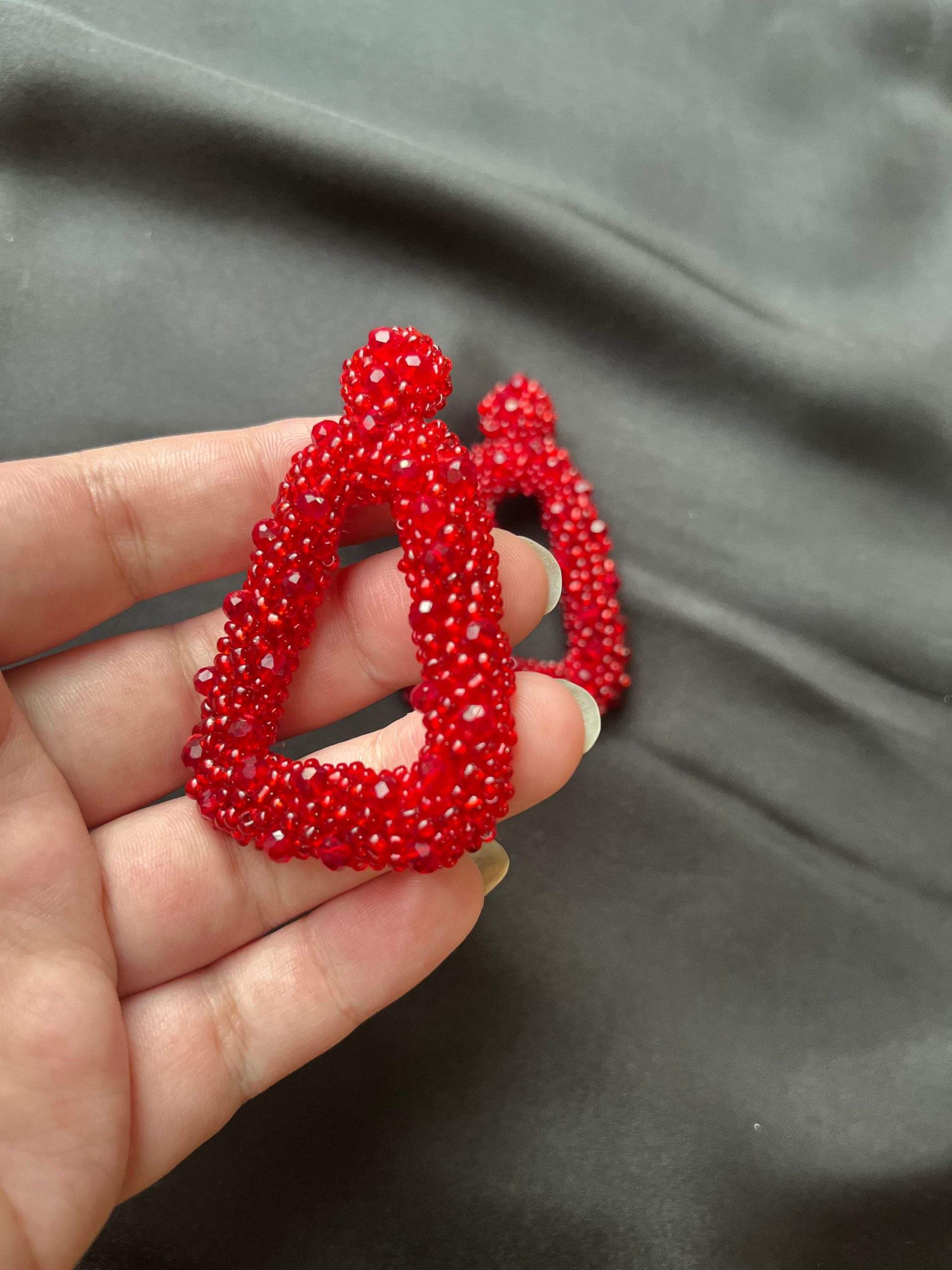 White and Red beaded earrings by Zarwish Javid