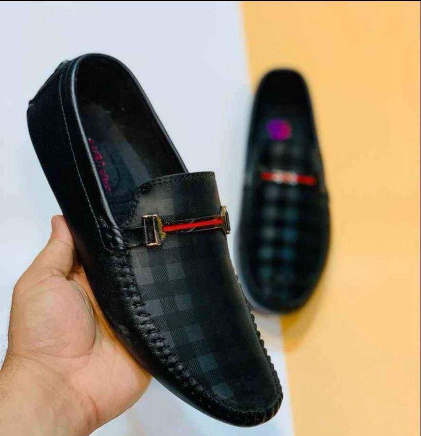 Shoes by Qayyoom Jutt