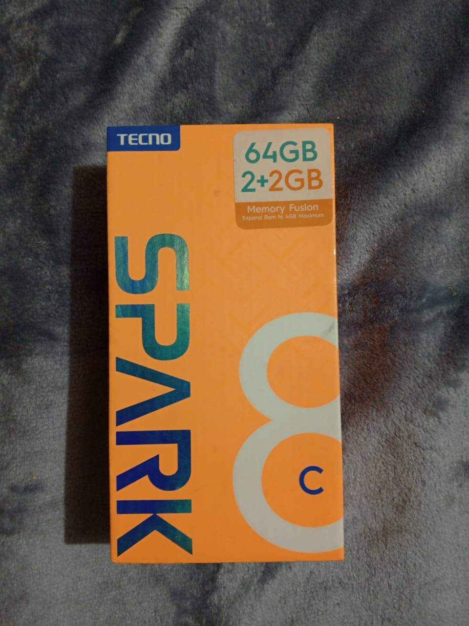 Tecno spark 8c with original charger and box by Qasim Ali