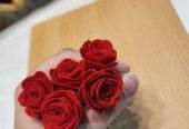 Red rose hair pins by Zarwish Javid