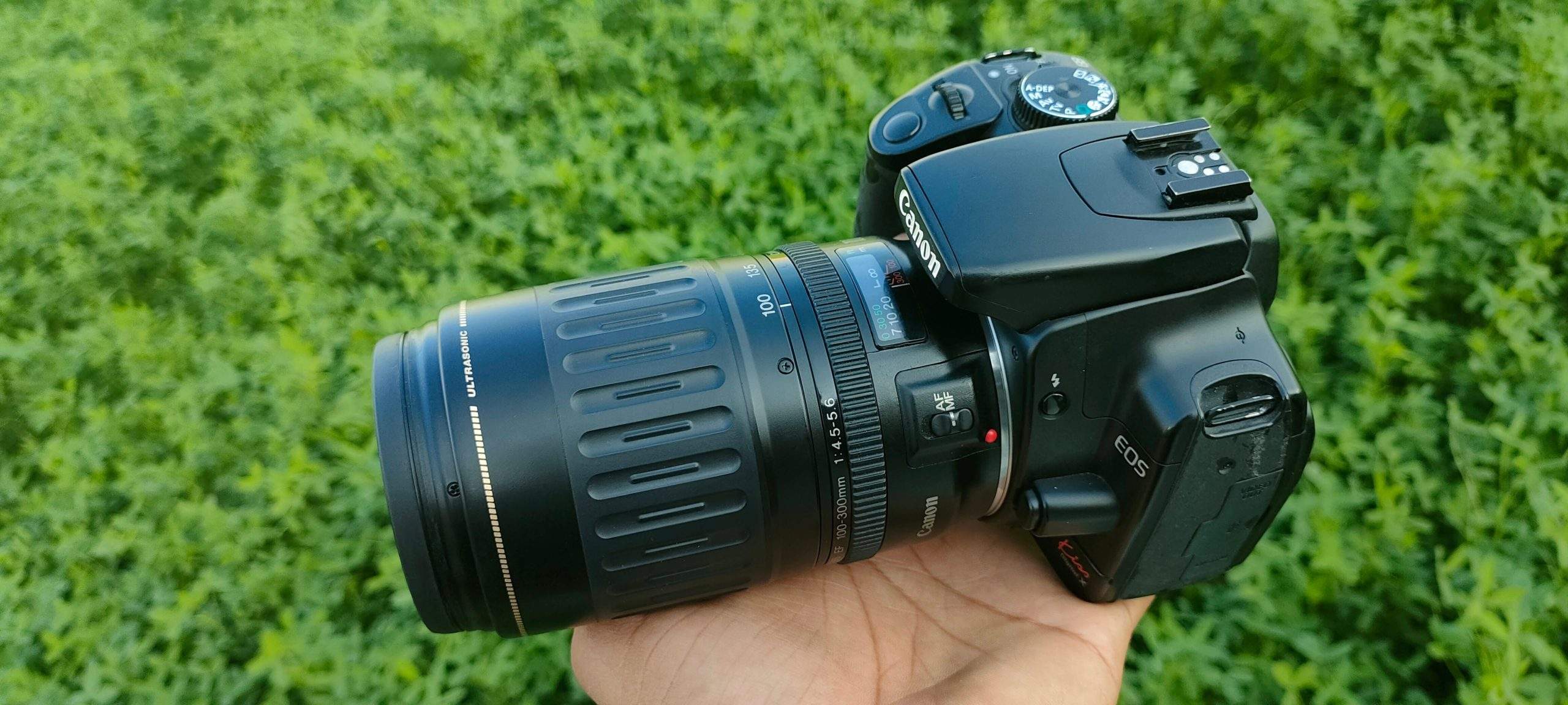 CANON 400D with 100_300mm lens (cash on delivery available) by zada raees16