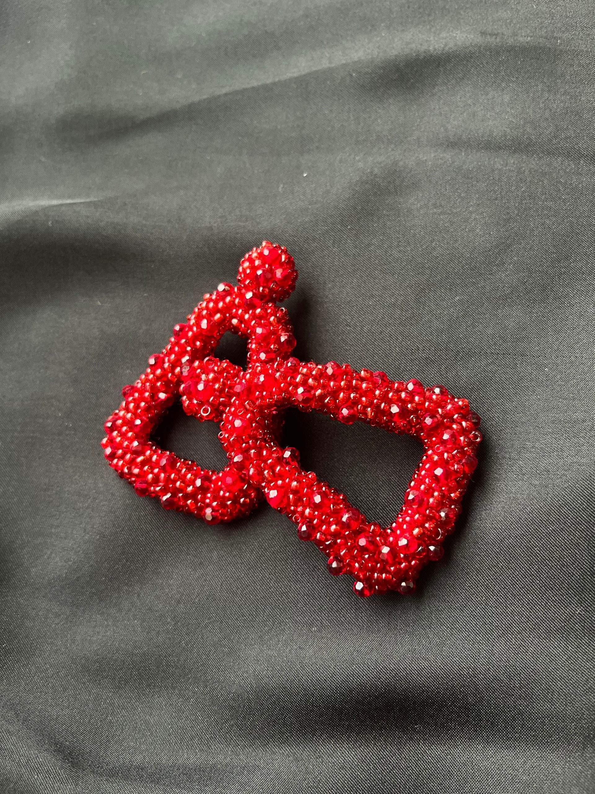 White and Red beaded earrings by Zarwish Javid