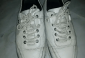 Sneakers shoes by Nomi Raja