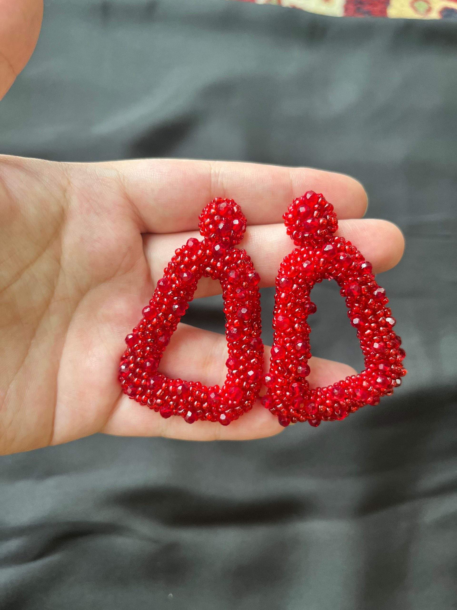 White and Red beaded earrings by Zarwish Javid