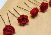 Red rose hair pins by Zarwish Javid