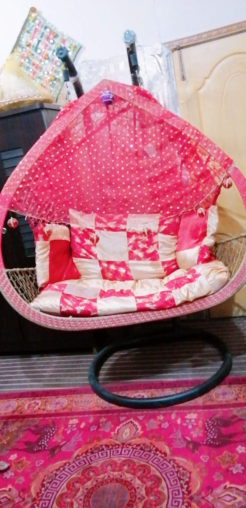 A double seat swing (Jhoola) by Eisha Khan