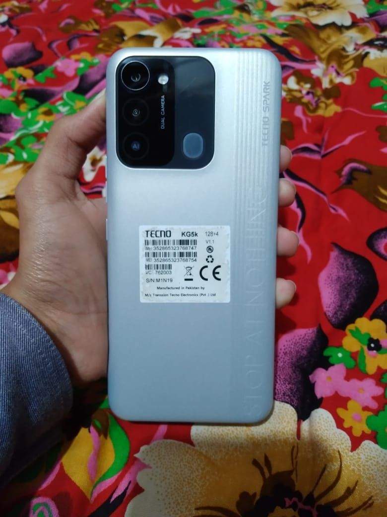 Tecno spark 8c with charger by Atif Ali