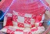 A double seat swing (Jhoola) by Eisha Khan