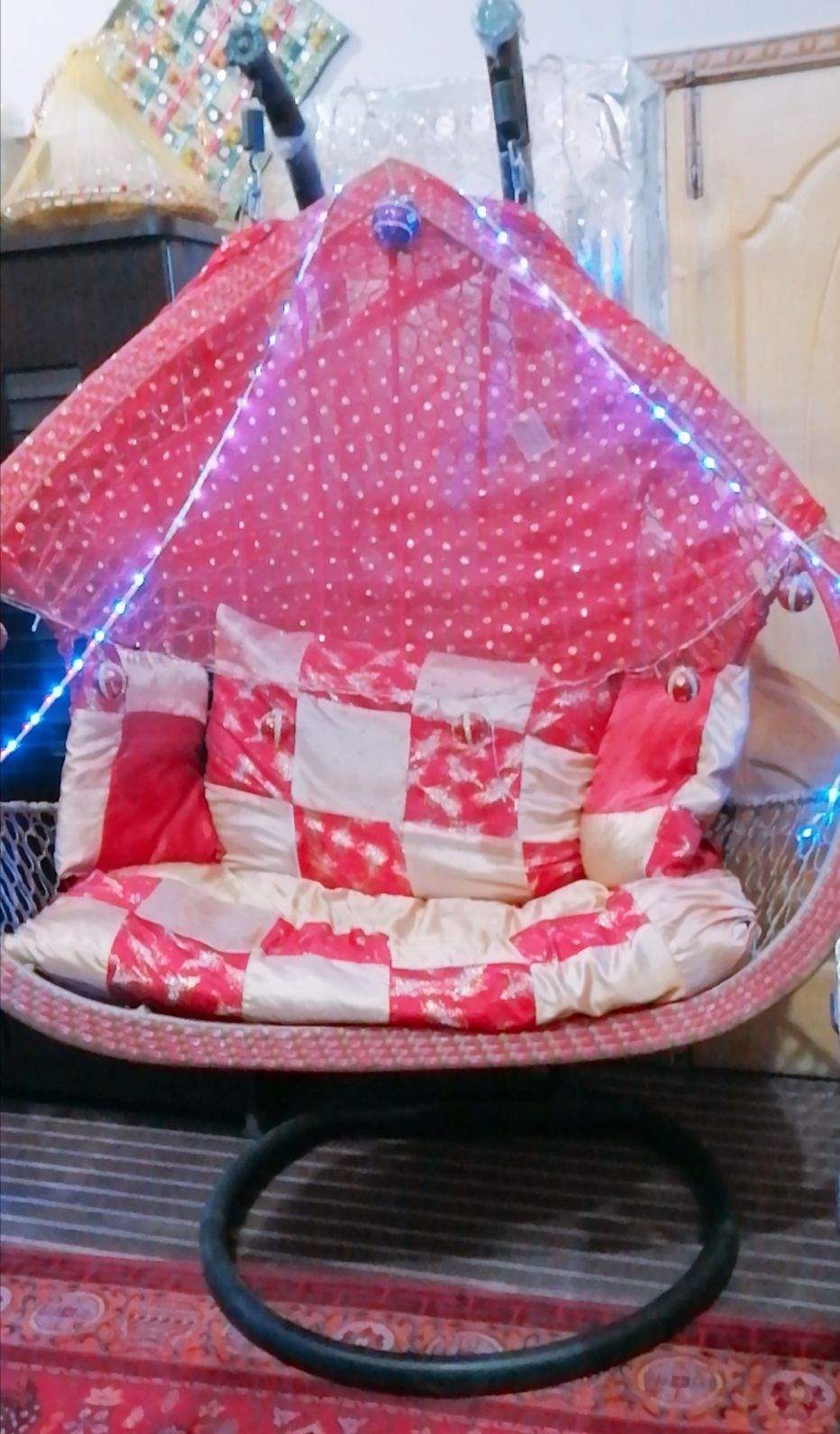 A double seat swing (Jhoola) by Eisha Khan