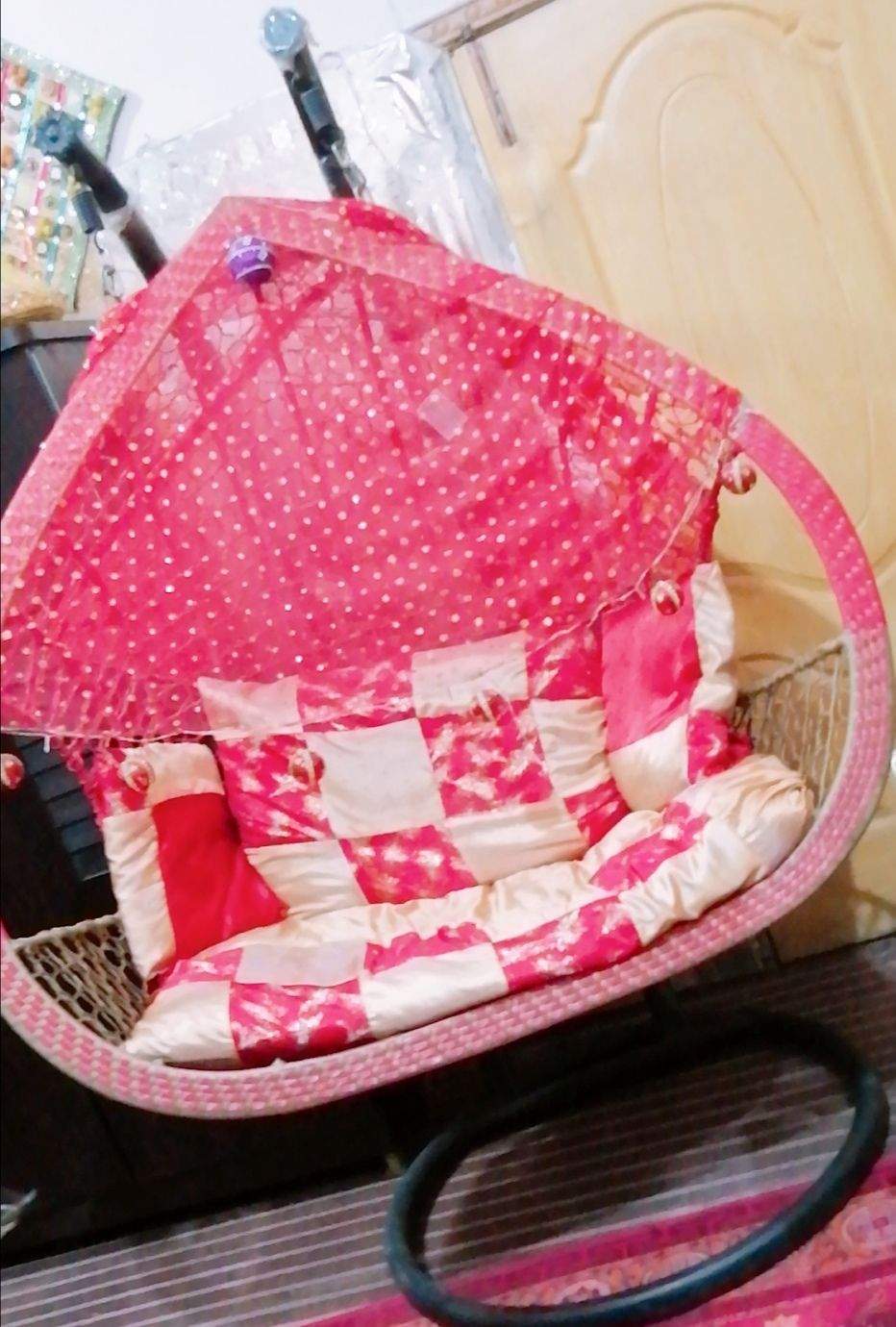 A double seat swing (Jhoola) by Eisha Khan