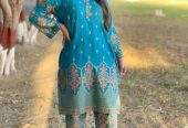 Woman stitched dress by Saghir