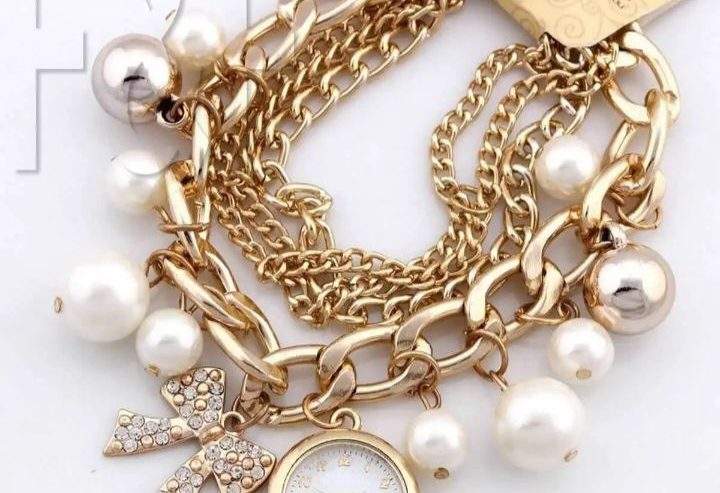 Gold pearl bracelet watch for girls by Jamil Akhtar