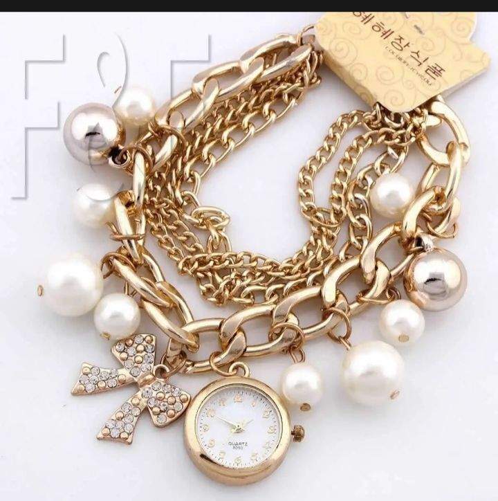 Gold pearl bracelet watch for girls by Jamil Akhtar