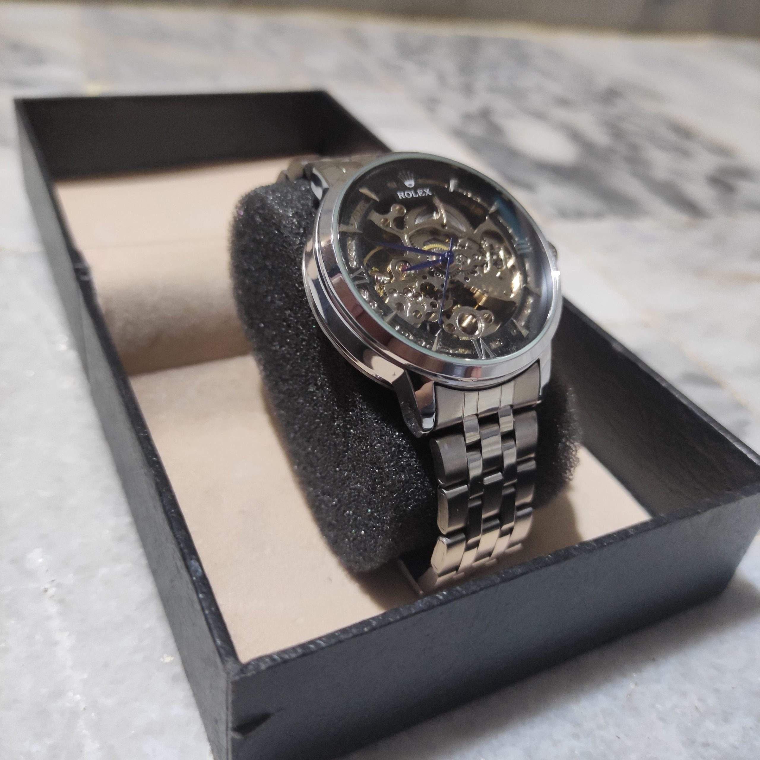 Rolex skeleton Automatic silver and black dial by Muneeb Asif