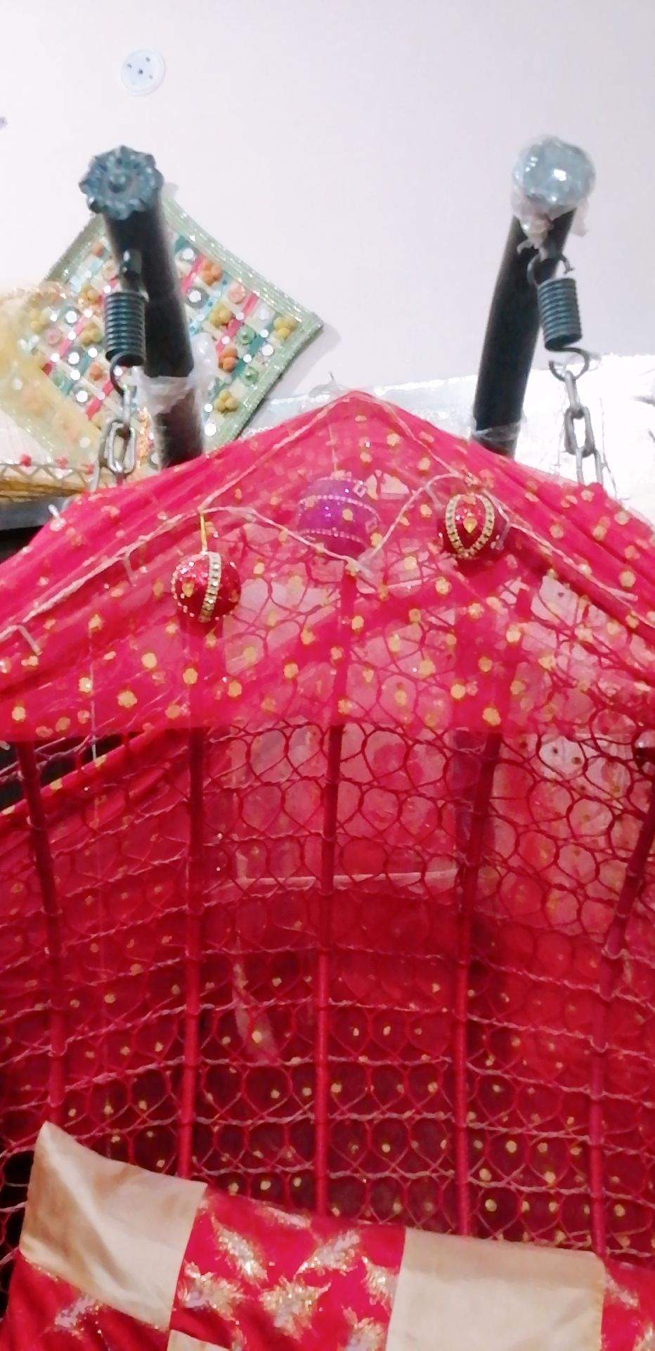 A double seat swing (Jhoola) by Eisha Khan