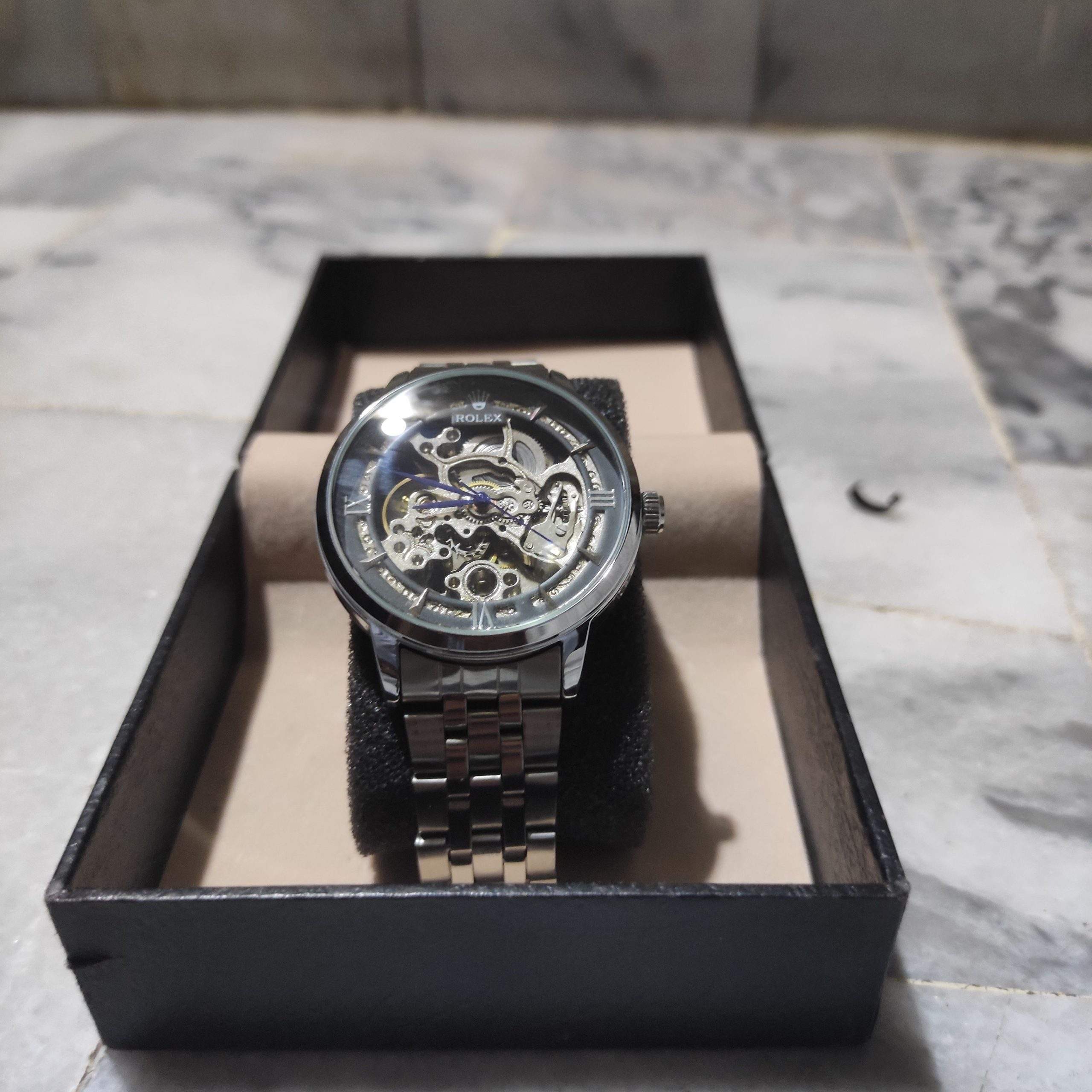 Rolex skeleton Automatic silver and black dial by Muneeb Asif