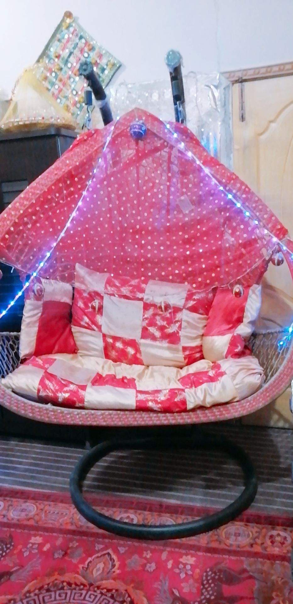 A double seat swing ( Jhoola) by Eisha Khan