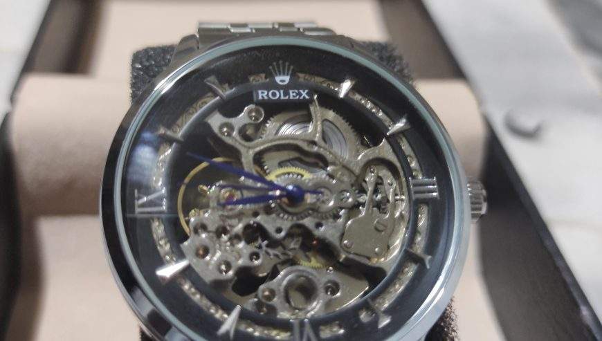 Rolex skeleton Automatic silver and black dial by Muneeb Asif