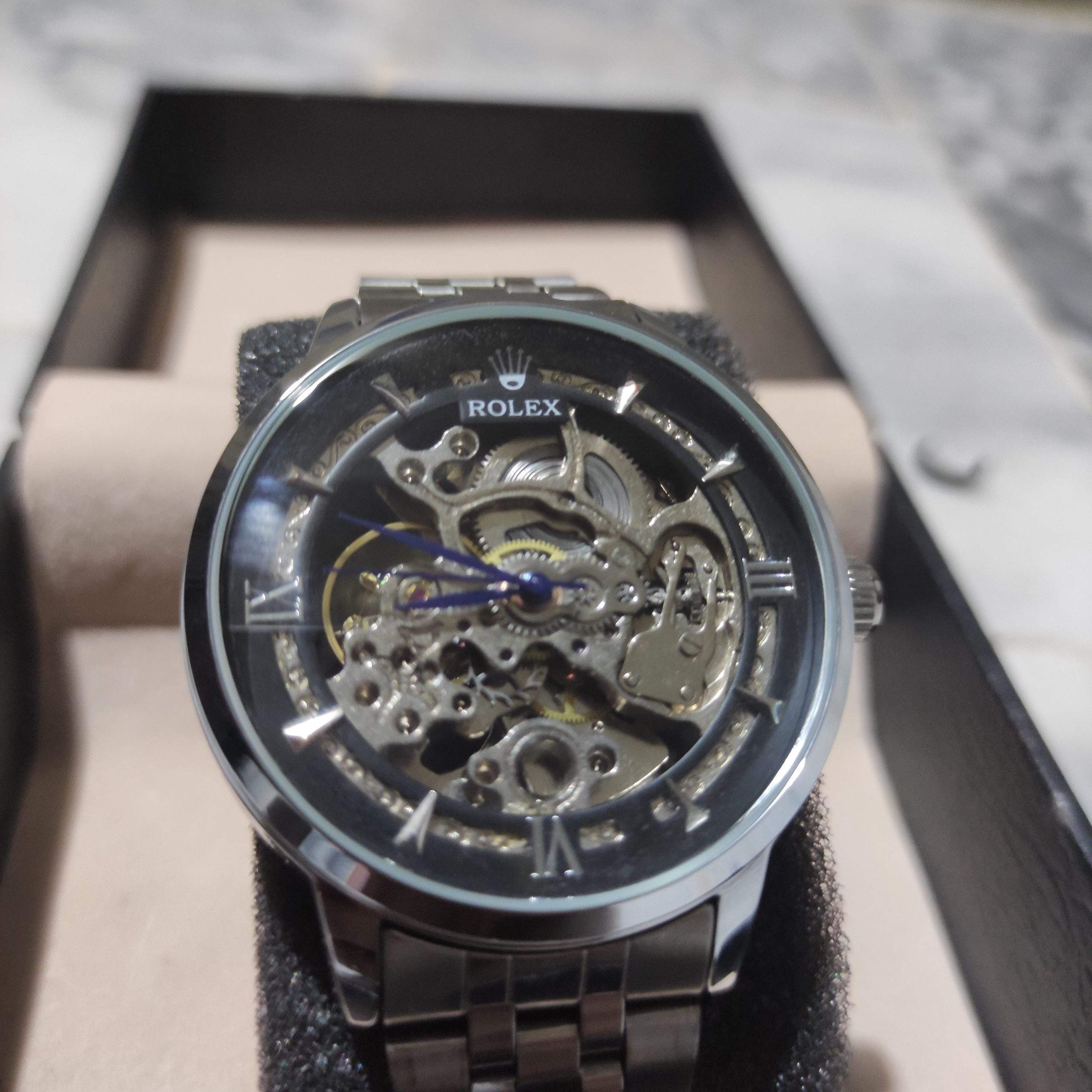 Rolex skeleton Automatic silver and black dial by Muneeb Asif