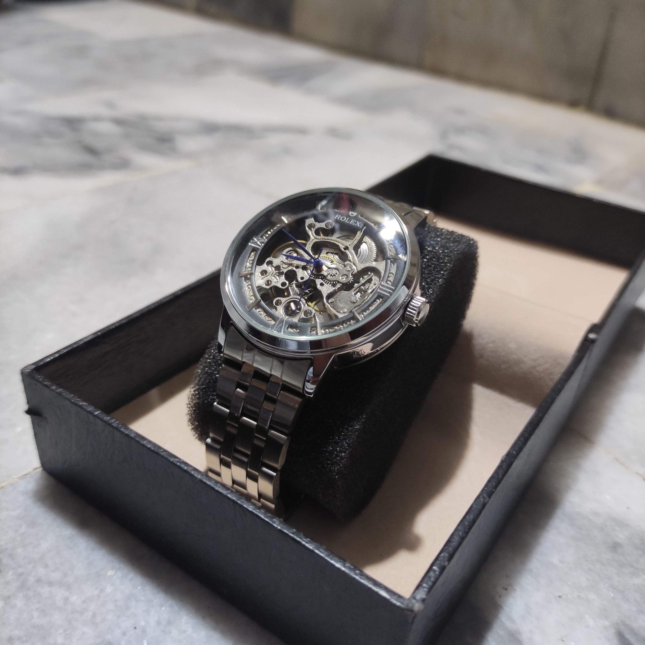 Rolex skeleton Automatic silver and black dial by Muneeb Asif