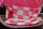 A double seat swing (Jhoola) by Eisha Khan