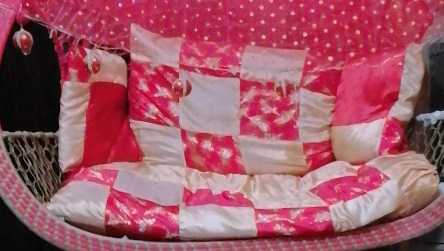 A double seat swing (Jhoola) by Eisha Khan