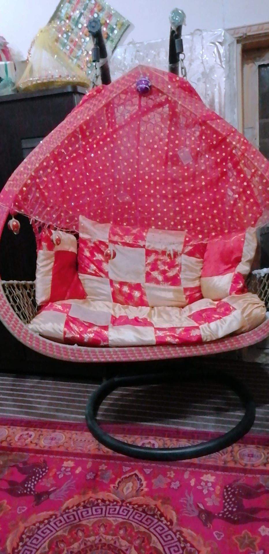 A double seat swing (Jhoola) by Eisha Khan