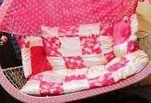 A double seat swing (Jhoola) by Eisha Khan
