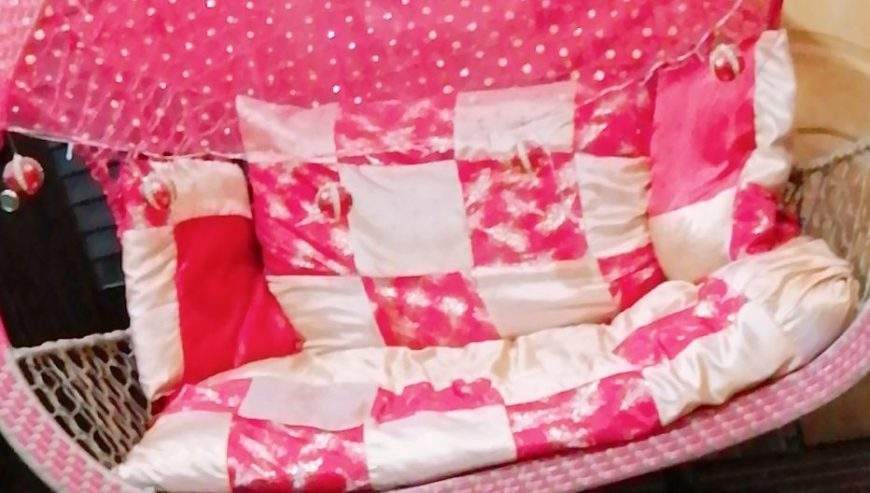 A double seat swing (Jhoola) by Eisha Khan