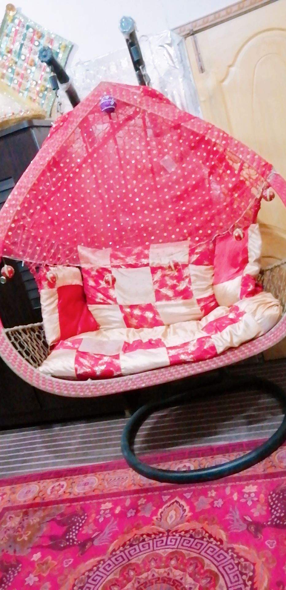 A double seat swing (Jhoola) by Eisha Khan