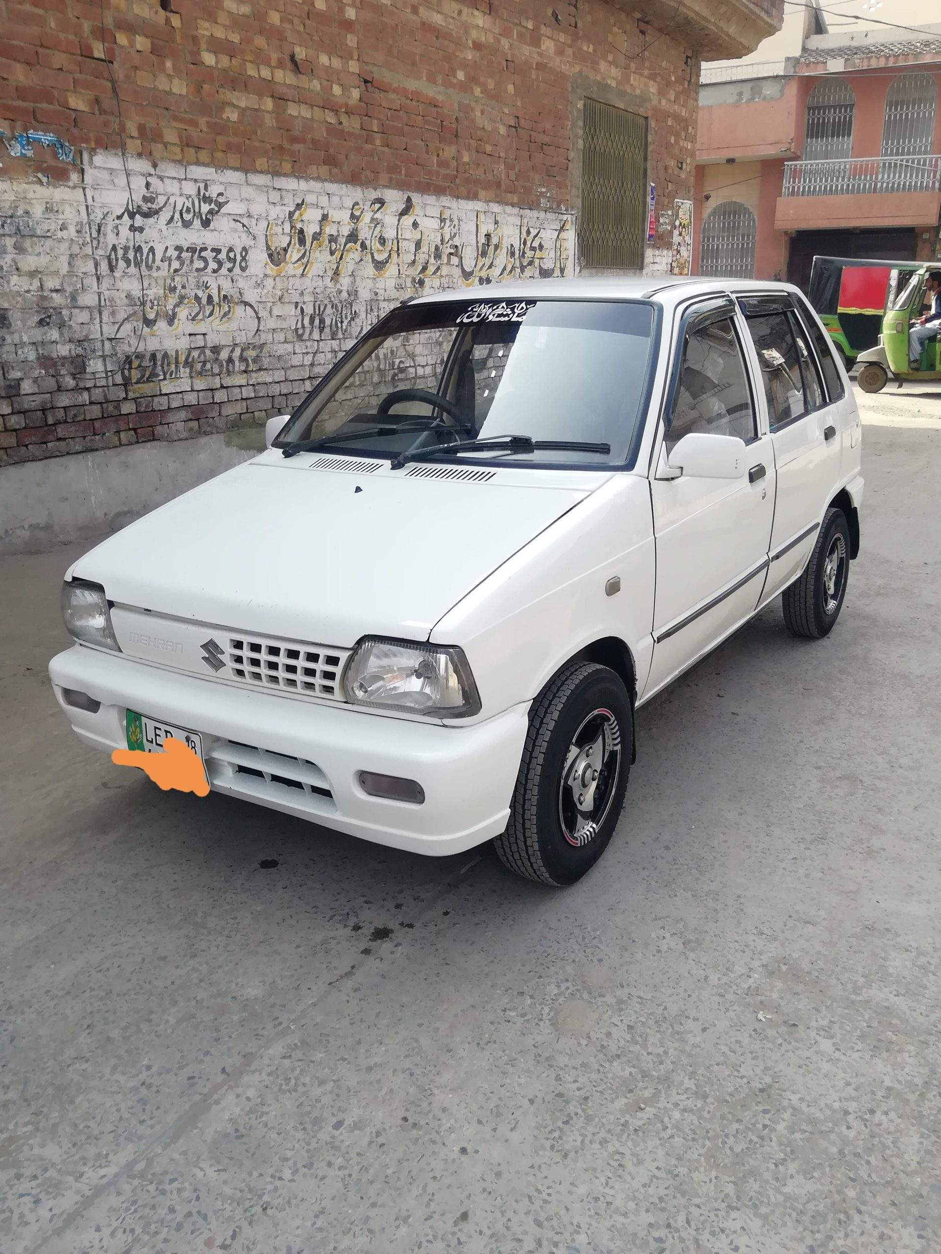 Suzuki mehran total geniune by Sami Ullah