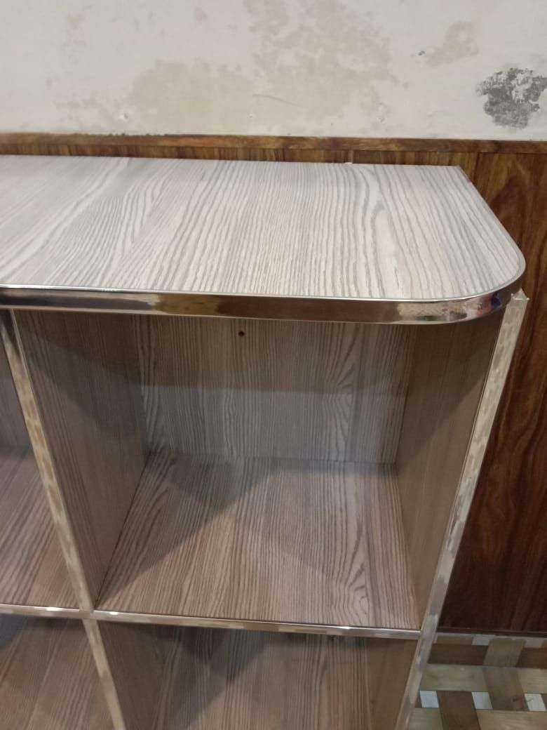 Storage shelf for books and crockery