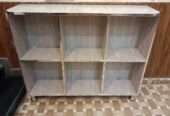 Storage shelf for books and crockery