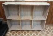 Storage shelf for books and crockery